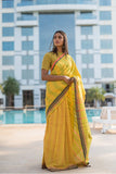 Turmeric yellow saree with chilli flakes and peppercorn dots. - noolbyhand.com